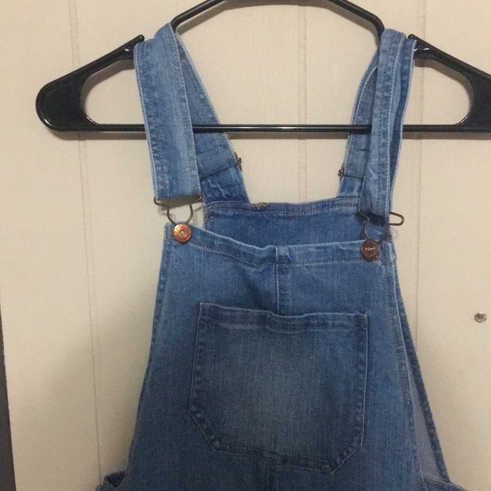 Ripped skinny jean style overalls
